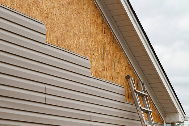 Professional Siding Repair technician working in Commercial Point, OH
